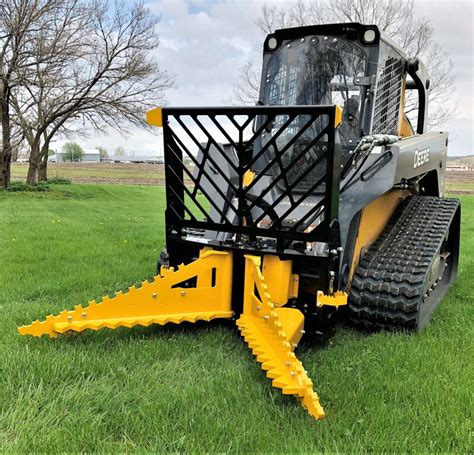 skid steer tree puller video|cl dominator tree puller.